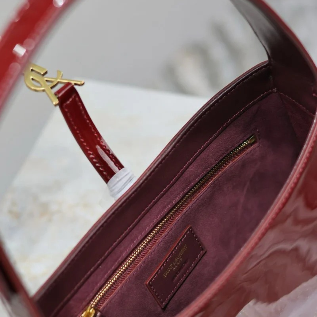 YVES SAINT LAURENT LE 5 À 7 BAG IN PATENT LEATHER
